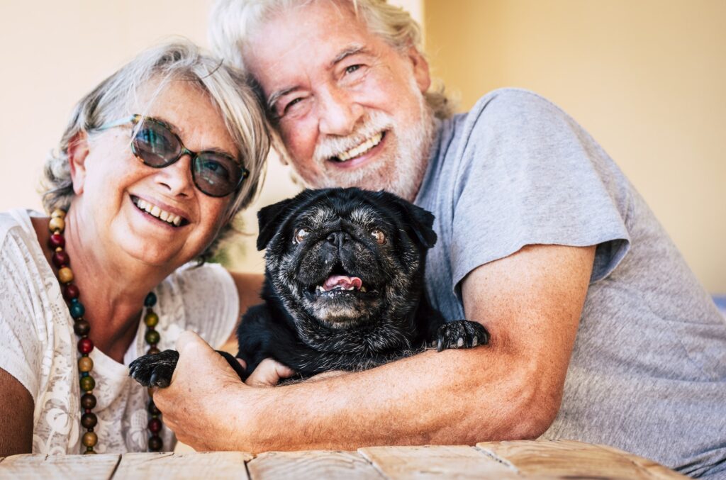 Cheerful alternative family with old senior couple